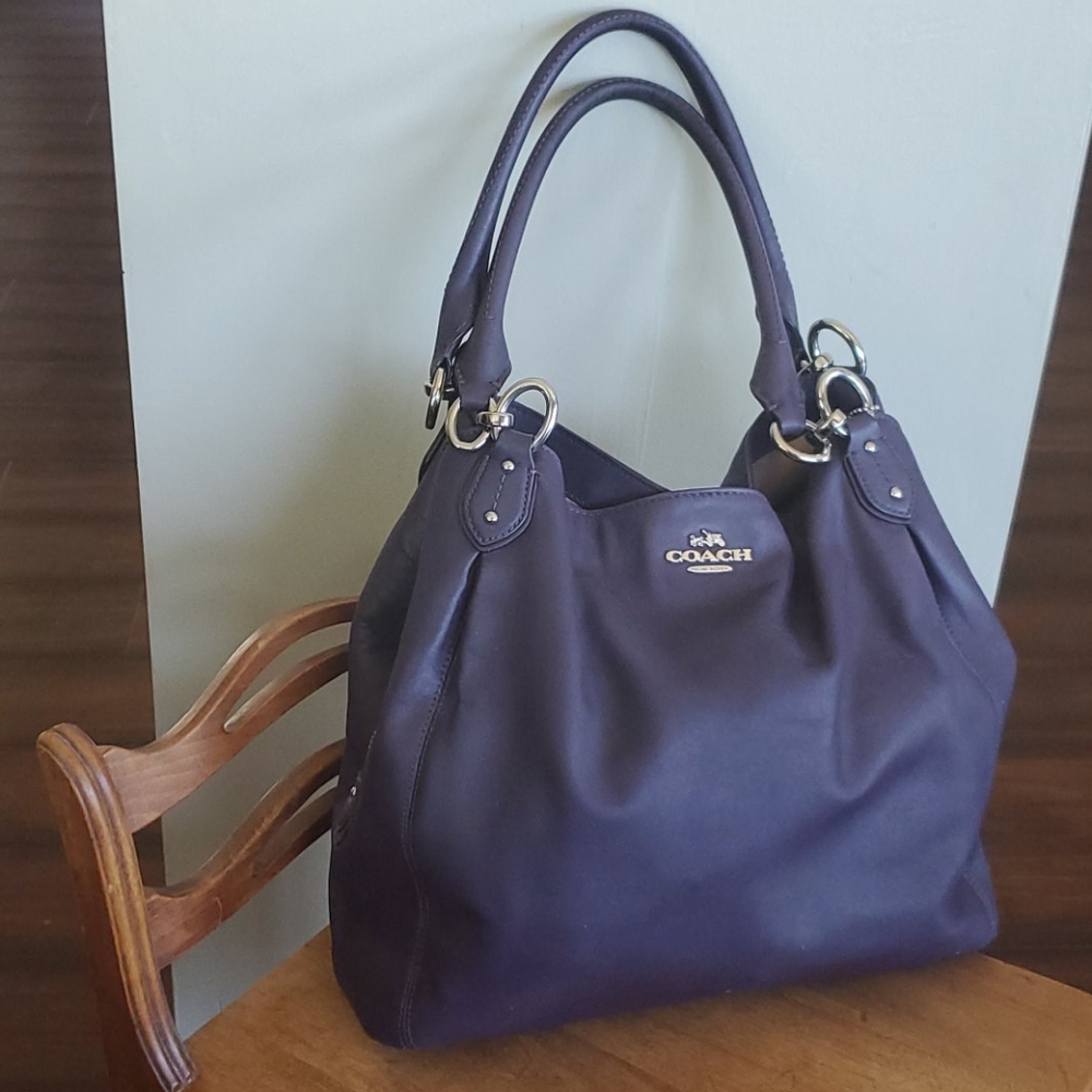 Plum Coach purse